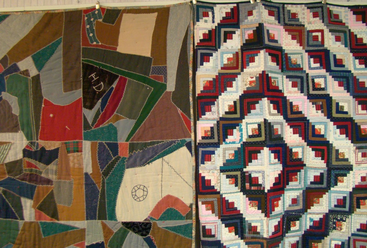 Appraisal: TWO PATCHWORK QUILTS One in a multicolored log cabin pattern