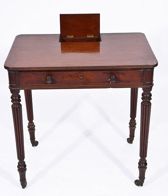 Appraisal: A GEORGE IV MAHOGANY RECTANGULAR WRITING TABLE in the manner