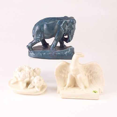 Appraisal: ROOKWOOD Three assorted Production bookends a blue elephant a white