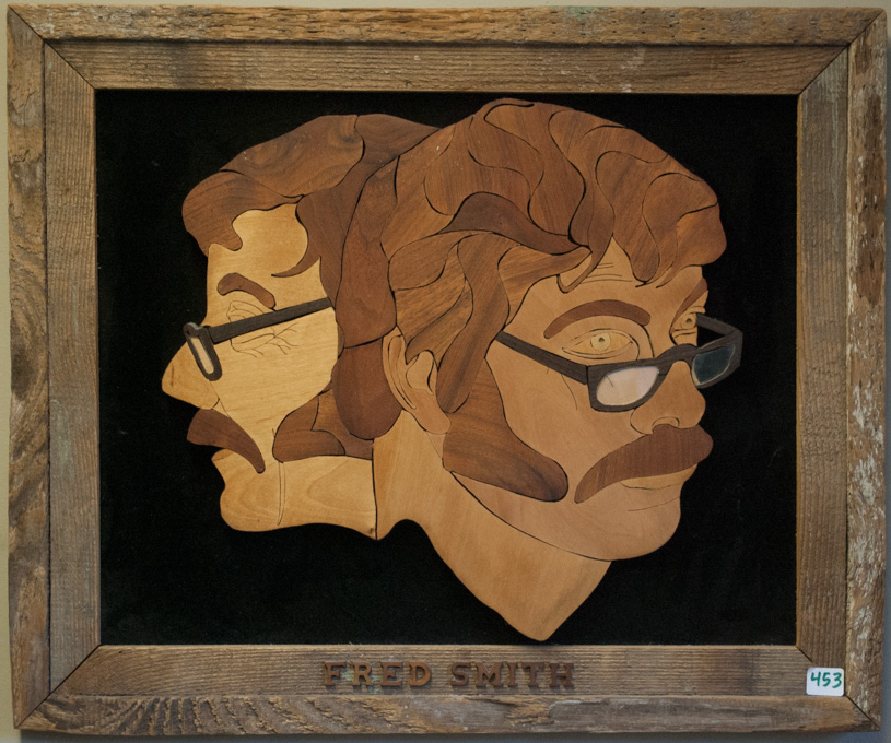 Appraisal: DON COLLINS MARQUETRY WOOD PORTRAIT depicting Fred Smith Image measures