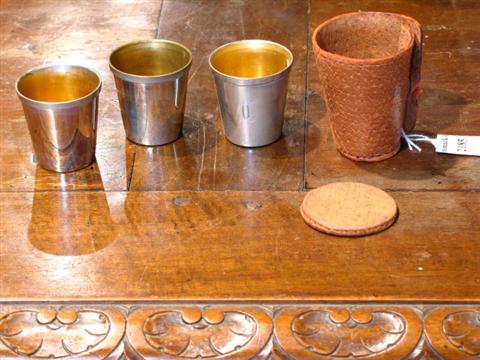 Appraisal: SET OF THREE SILVER PLATED SHOT GLASSES Early th century