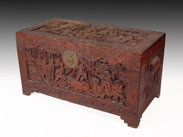 Appraisal: CHINESE CARVED TRUNK CHEST Heavily carved with village scenes Measures