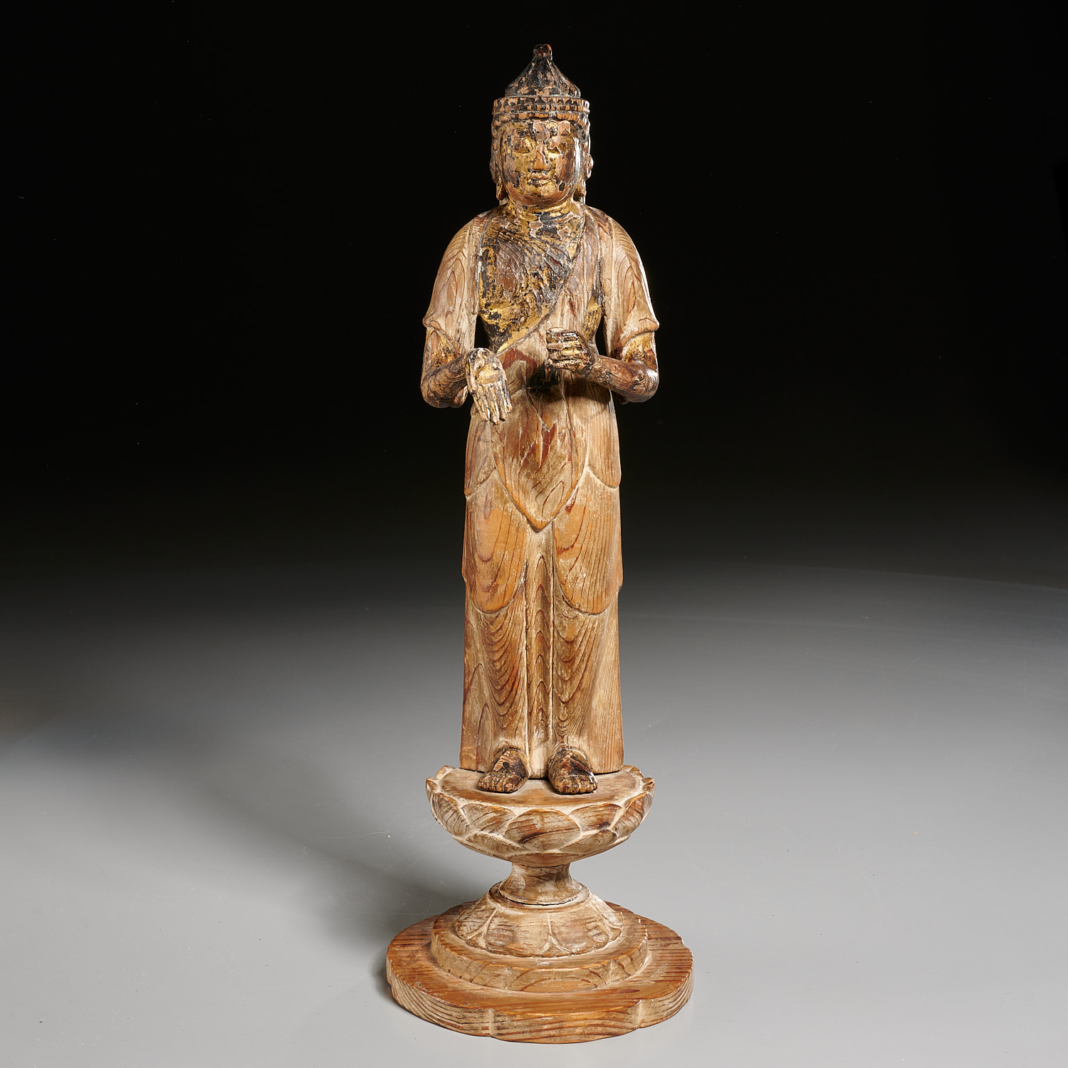 Appraisal: ANTIQUE CARVED GILTWOOD STANDING BUDDHA Likely Qing Dynasty th c