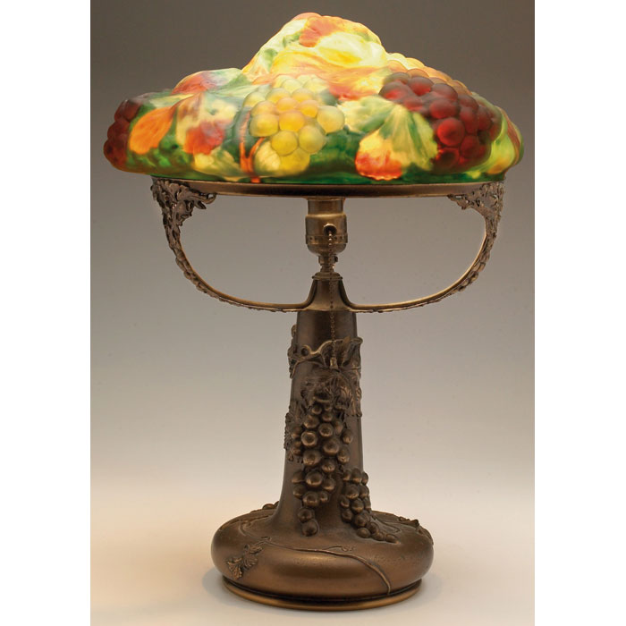 Appraisal: Unusual Pairpoint Puffy table lamp elaborate three-arm bronzed metal base