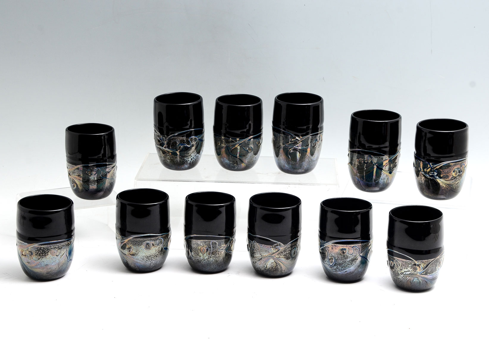 Appraisal: PC FREDERICK WARREN STUDIO ART GLASS TUMBLERS Black glass tumblers