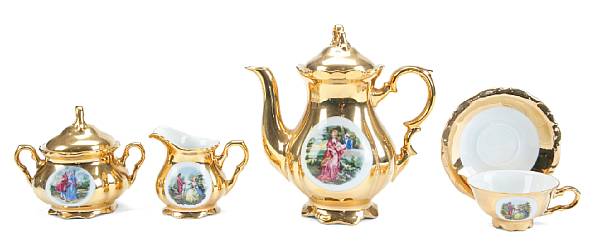 Appraisal: A Bavarian gilt heightened porcelain tea service comprising a teapot