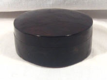 Appraisal: A circular tortoiseshell box with pull off lid