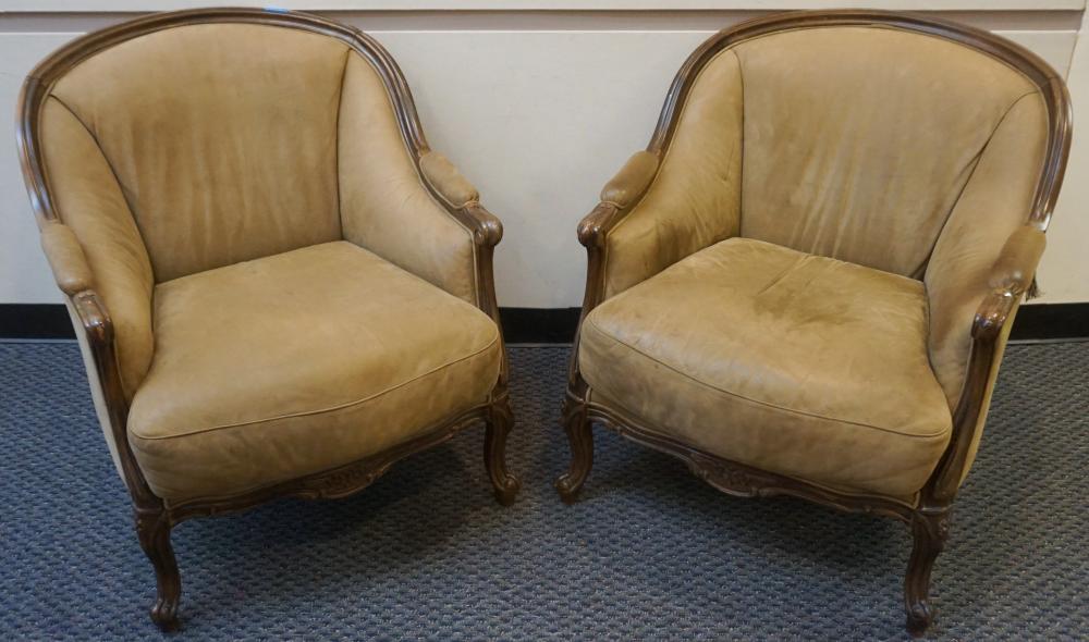 Appraisal: Pair Provincial Style Fruitwood Suede Upholstered Barrel-Back Bergeres x x