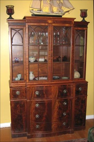 Appraisal: RICHLY GRAINED BANDED MAHOGANY BREAKFRONT SECRETARY DESK Bookcase or china