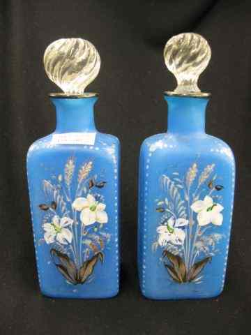 Appraisal: Pair of Victorian Art Glass Dresser Bottles enameled floral on