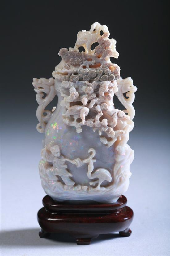 Appraisal: CHINESE OPAL VASE AND COVER th century Carved to depict