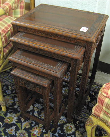 Appraisal: A NESTING SET OF CARVED TEAKWOOD QUARTETTO TABLES Chinese th