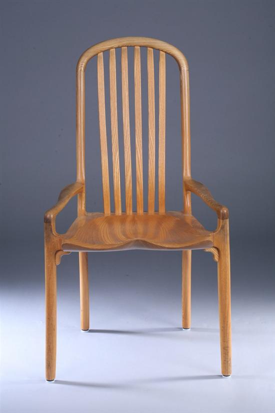 Appraisal: NAKASHIMA-INFLUENCED CARVED OAK ARM CHAIR th century signed Robert Erickson