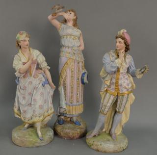 Appraisal: Three large porcelain bisque figures all elaborately paint decorated with