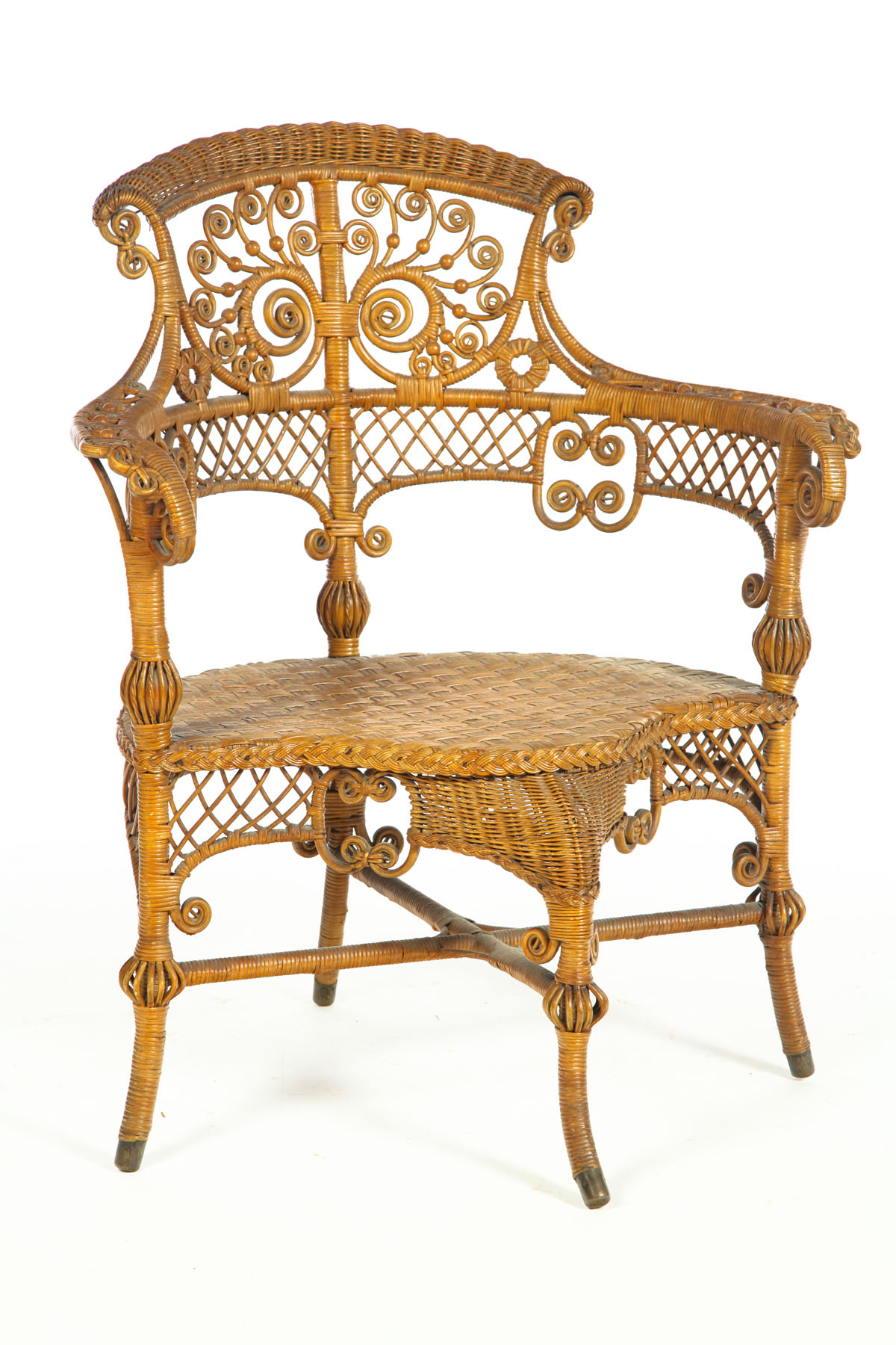 Appraisal: ORNATE WICKER ARMCHAIR American late th-early th century wicker Studio