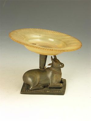 Appraisal: An Anglo-Indian carved horn dish with a cow support in