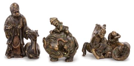 Appraisal: Group of Three Chinese Bronze Scroll Weights Estimate -