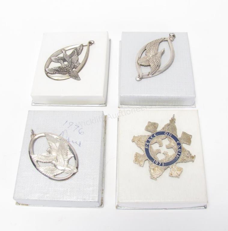 Appraisal: Four Wallace Peace on Earth sterling annual medallions including and