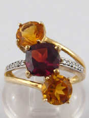 Appraisal: A yellow metal tests carat gold garnet citrine and diamond