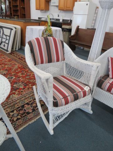 Appraisal: Antique Wicker Rocker recent upholstery and cushion