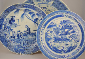 Appraisal: Four Chinese blue and white dishes variously decorated with figures