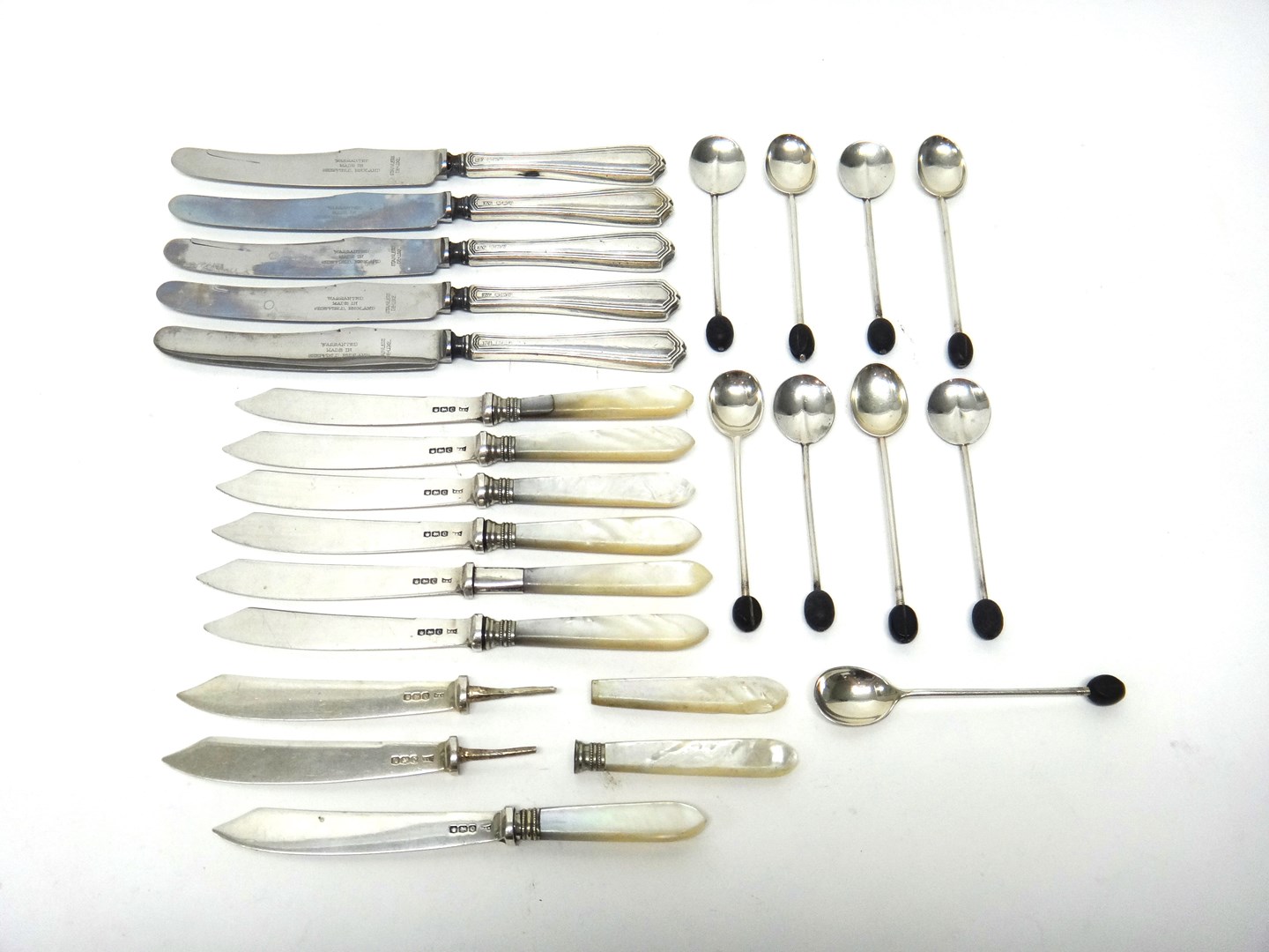 Appraisal: Nine various silver coffee spoons having black bean terminals to