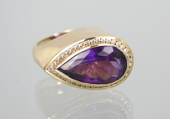 Appraisal: A Contemporary Design Amethyst and Diamond Ring Heavy k yellow