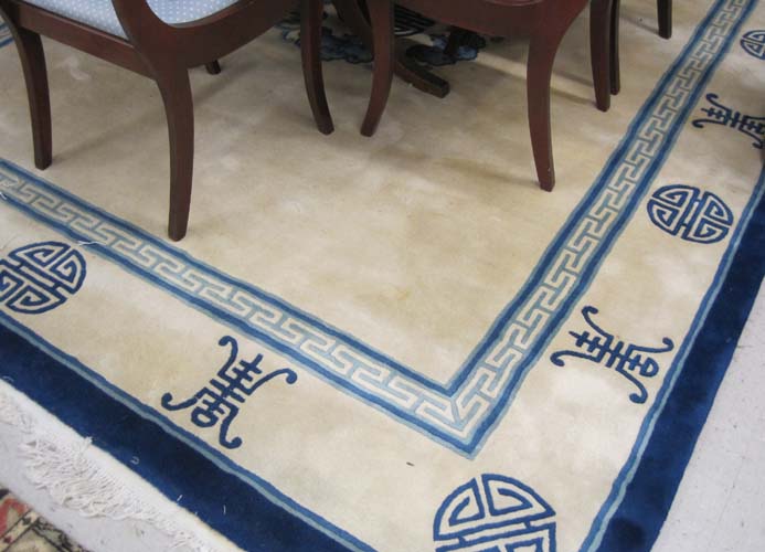 Appraisal: TWO CHINESE BLUE IVORY RUGS hand knotted in traditional Peking