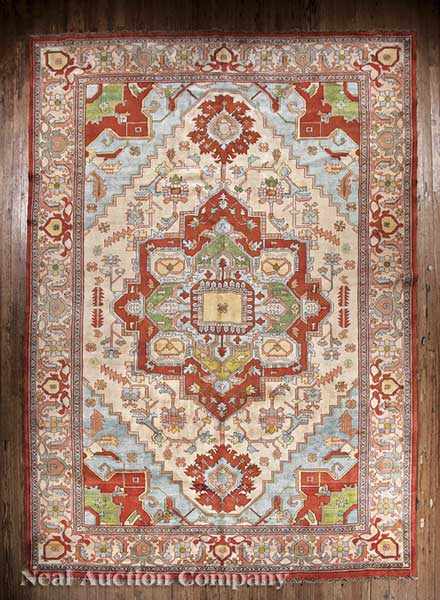 Appraisal: A Persian Serapi Carpet cream and pale blue ground central