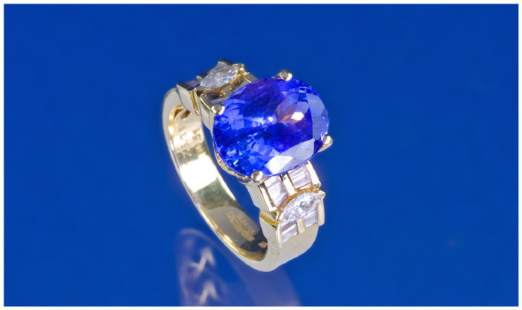 Appraisal: ct Gold Tanzanite And Diamond Ring Central Oval Brilliant Cut