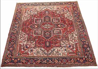 Appraisal: A Semi-Antique Heriz Carpet Almost squared shape minimal fringed at