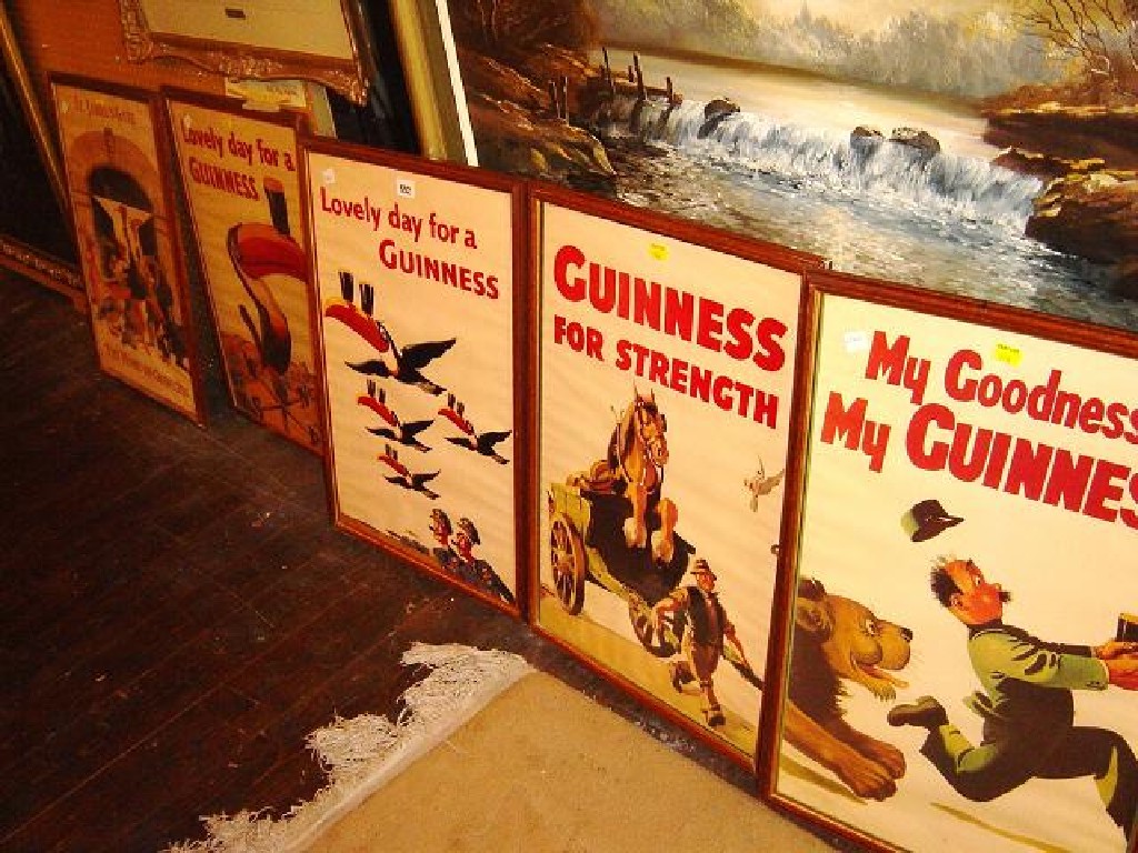 Appraisal: A set of coloured Guinness advertising posters including flying toucans