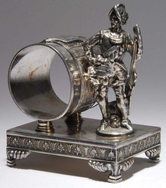 Appraisal: Conquistador Holding Rifle Figural Napkin Ring Description Conquistador holding a