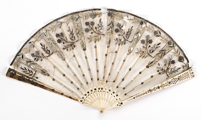 Appraisal: SMALL SWEET MESH AND IVORY FOLDING FAN th CenturySilver sequins