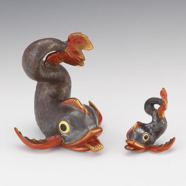 Appraisal: TWO HEREND PORCELAIN KOI FISH FIGURINES Two porcelain koi fish