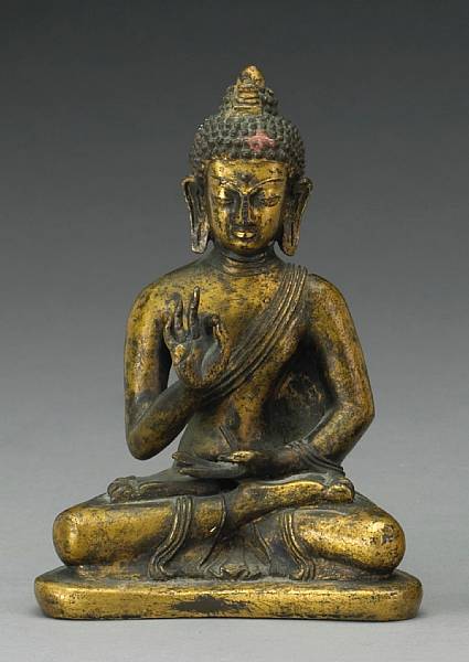 Appraisal: A Tibetan gilt bronze seated figure of Maitreya th th