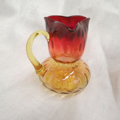 Appraisal: Amberina Art Glass Creamer Mt Washington thumbprint triangular top excellent