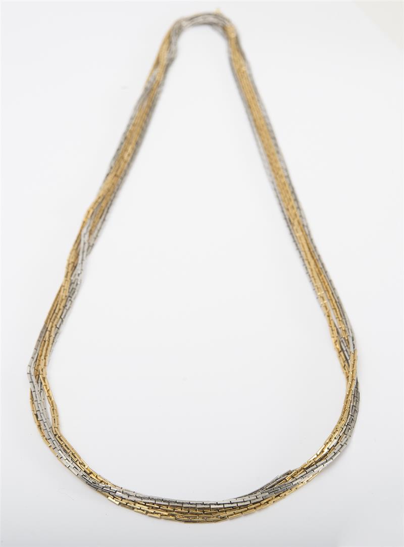 Appraisal: K YELLOW AND WHITE GOLD LONG CHAIN Signed 'Grosse Germany'