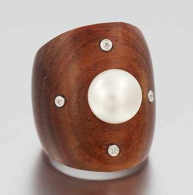 Appraisal: A Carved Mahogany Pearl and Diamond Ring Carved mahogany ring