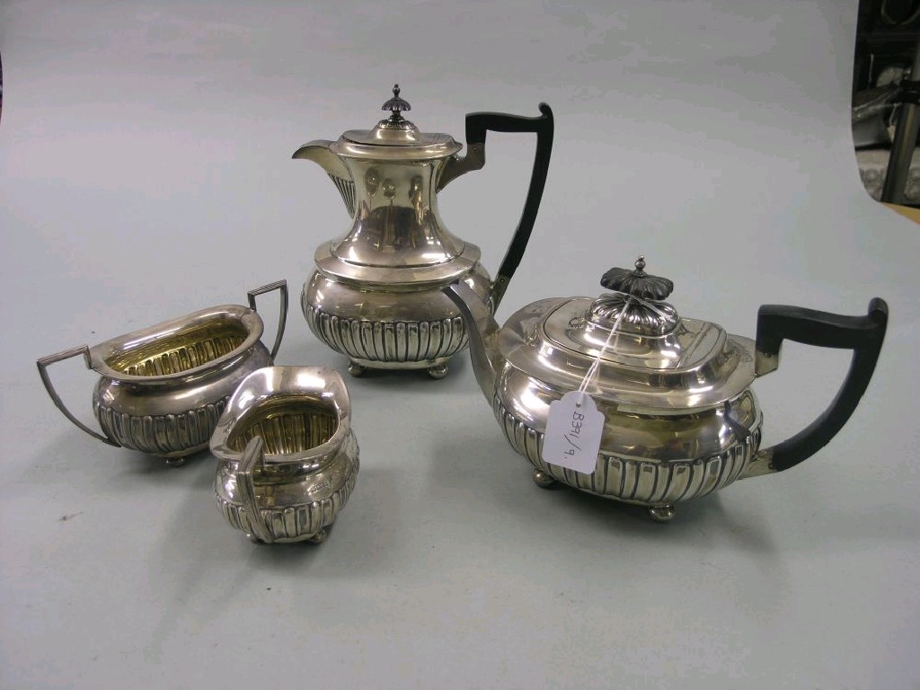 Appraisal: A silver four piece teaset consisting of teapot hot water