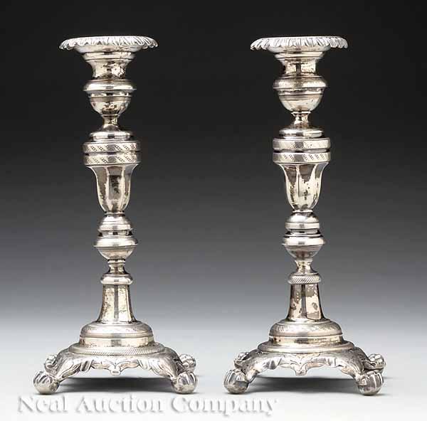 Appraisal: A Pair of Antique Continental Silverplate Table Candlesticks baluster stems