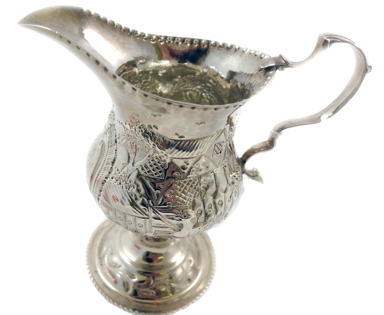 Appraisal: A George III silver ogee cream jug London makers mark