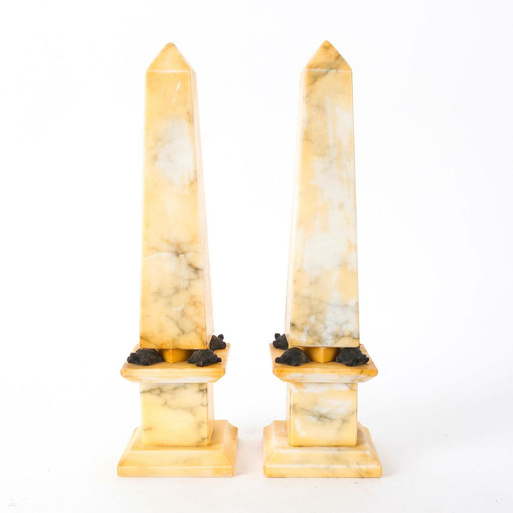 Appraisal: VINTAGE ASIAN CREAM MARBLE DECORATIVE OBELISKS Smooth cut marble with