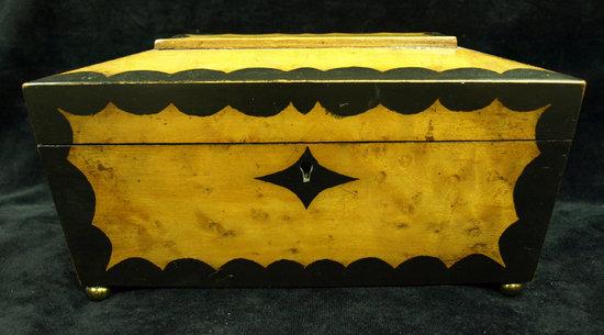 Appraisal: A Regency satinwood sarcophagus shaped tea caddy with pen and