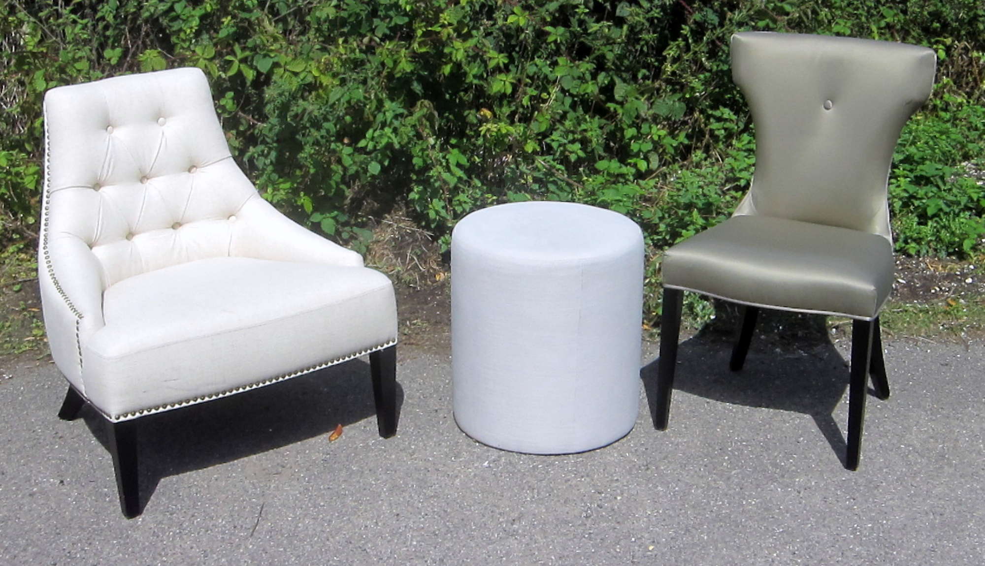 Appraisal: Cream upholstered button back chair similar circular footstool and a