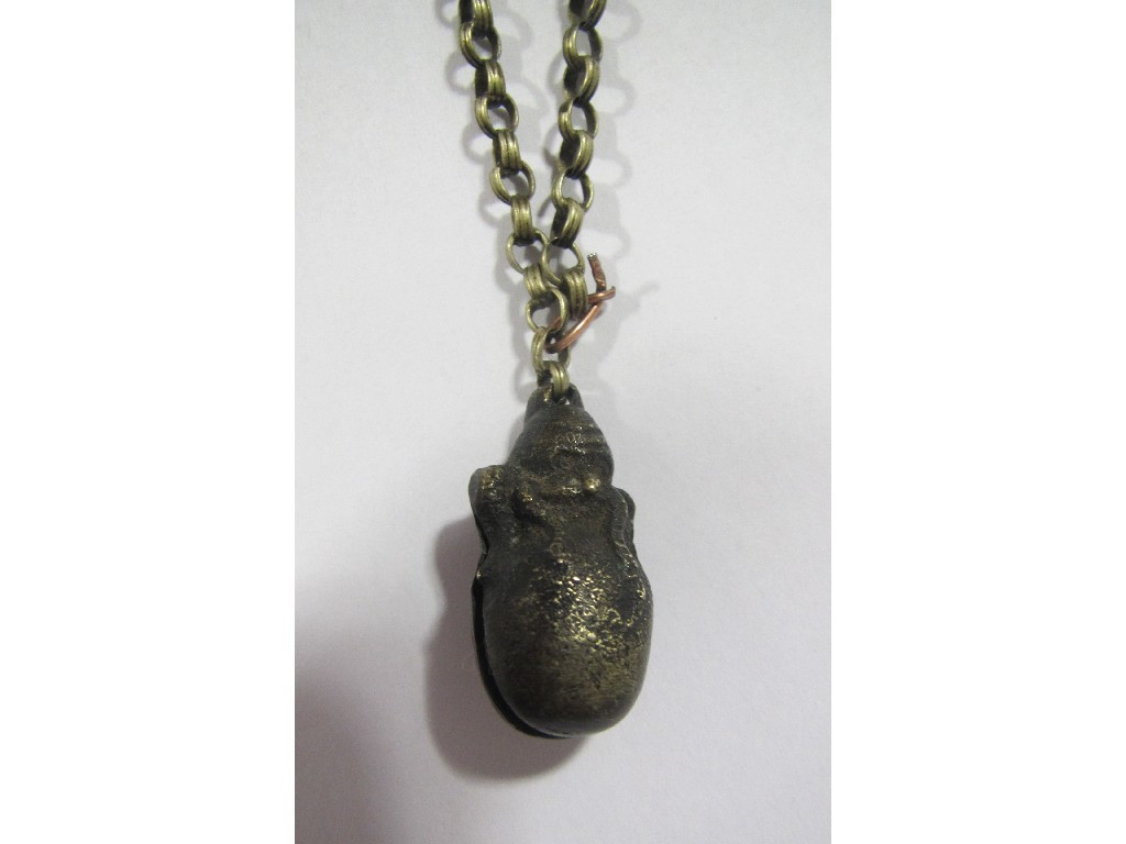 Appraisal: Bell pendant in the form of a grotesque figure on