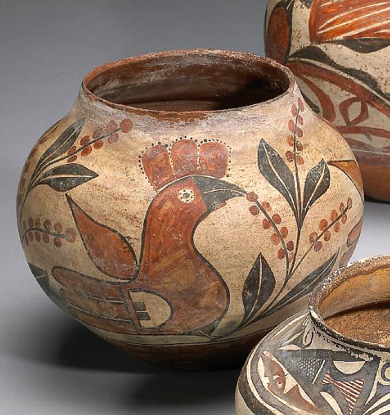 Appraisal: A Zia polychrome jar Depicting three large-scale bird figures perched