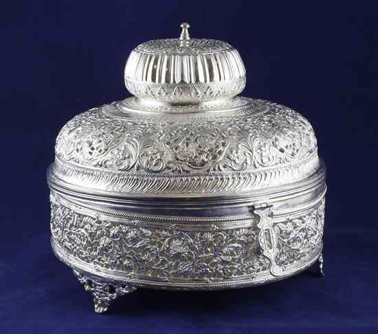 Appraisal: An Indian white metal turban box with double domed hinged