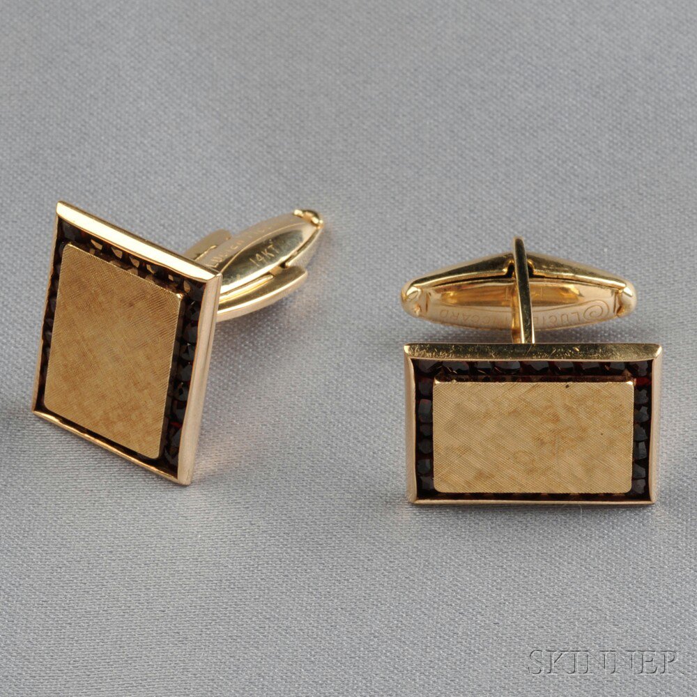 Appraisal: kt Gold and Garnet Cuff Links Lucien Piccard each designed