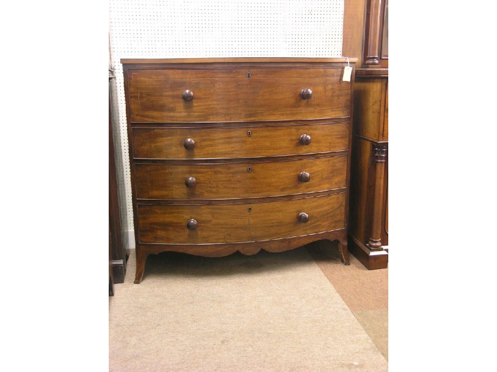 Appraisal: A William IV bow fronted mahogany chest the deep upper